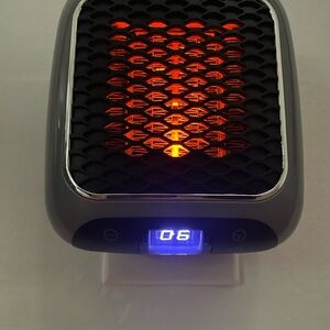 Compact Gray Electric Heater (plug in)